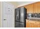 Stainless steel refrigerator in the kitchen at 21113 S 223Rd Way, Queen Creek, AZ 85142