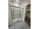 Bathroom with a large walk-in shower and tile flooring at 2113 E Bucking Bronco Dr, San Tan Valley, AZ 85140