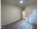 Simple bedroom with gray carpet and neutral walls at 2113 E Bucking Bronco Dr, San Tan Valley, AZ 85140