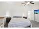 Spacious bedroom with large bed and TV at 22194 N Kingston Dr, Maricopa, AZ 85138