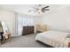 Bedroom with dresser, crib and large bed at 22194 N Kingston Dr, Maricopa, AZ 85138