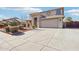 Two-story house with landscaped front yard and attached two-car garage at 22194 N Kingston Dr, Maricopa, AZ 85138