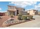 Two-story house with landscaped front yard and attached two-car garage at 22194 N Kingston Dr, Maricopa, AZ 85138