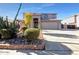 Two-story house with landscaped front yard, driveway, and two-car garage at 22194 N Kingston Dr, Maricopa, AZ 85138