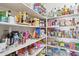 Well-stocked pantry with ample shelving at 22194 N Kingston Dr, Maricopa, AZ 85138