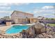 Stunning pool and patio area, perfect for outdoor entertaining at 22194 N Kingston Dr, Maricopa, AZ 85138