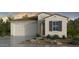 Single-story home with a tile roof, two-car garage, and landscaped front yard at 25226 N 172Nd Dr, Surprise, AZ 85387