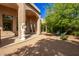 Relaxing backyard patio with seating area and desert landscaping at 26807 N 56Th St, Scottsdale, AZ 85266