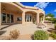 Large covered patio with beautiful architectural details and outdoor seating at 26807 N 56Th St, Scottsdale, AZ 85266