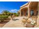 Spacious backyard patio with seating area and views of the pool at 26807 N 56Th St, Scottsdale, AZ 85266