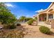 Landscaped backyard with pool, spa, and patio area at 26807 N 56Th St, Scottsdale, AZ 85266