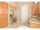 Vanity area with granite countertop and wood cabinets at 26807 N 56Th St, Scottsdale, AZ 85266
