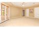 Bright bedroom featuring double doors to backyard at 26807 N 56Th St, Scottsdale, AZ 85266
