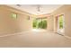 Spacious Primary bedroom with patio access and ample natural light at 26807 N 56Th St, Scottsdale, AZ 85266