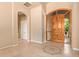 Elegant entryway with wood door and tile floors at 26807 N 56Th St, Scottsdale, AZ 85266