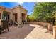 Front patio with seating area and decorative horse statue at 26807 N 56Th St, Scottsdale, AZ 85266