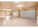 Bright and spacious three-car garage interior at 26807 N 56Th St, Scottsdale, AZ 85266
