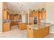 Spacious kitchen featuring granite countertops and a large island at 26807 N 56Th St, Scottsdale, AZ 85266
