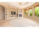 Spacious living room featuring a fireplace and built-in shelving at 26807 N 56Th St, Scottsdale, AZ 85266