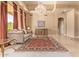Bright living room with chandelier and ornate rug at 26807 N 56Th St, Scottsdale, AZ 85266
