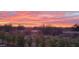 Stunning sunset view over desert landscape with blooming plants at 26807 N 56Th St, Scottsdale, AZ 85266
