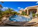 Relaxing kidney-shaped pool with a spa and a large patio area at 26807 N 56Th St, Scottsdale, AZ 85266