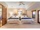Guest bedroom with two twin beds, mountain views and ceiling fan at 28626 N 108Th N Way, Scottsdale, AZ 85262