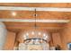 High ceiling with exposed beams and decorative painting at 28626 N 108Th N Way, Scottsdale, AZ 85262