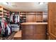 Spacious walk-in closet with ample shelving and drawers at 28626 N 108Th N Way, Scottsdale, AZ 85262