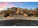 Stunning stone and stucco home with a gated entryway at 28626 N 108Th N Way, Scottsdale, AZ 85262