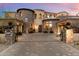 Luxury home with a gated entry and stone facade at 28626 N 108Th N Way, Scottsdale, AZ 85262