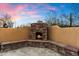 Cozy outdoor fireplace perfect for cool evenings at 28626 N 108Th N Way, Scottsdale, AZ 85262