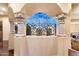 Elegant interior with decorative columns and a painted sky detail at 28626 N 108Th N Way, Scottsdale, AZ 85262