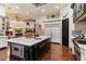 Island kitchen with marble countertop and high-end appliances at 28626 N 108Th N Way, Scottsdale, AZ 85262