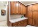 Well-equipped laundry room with ample cabinetry at 28626 N 108Th N Way, Scottsdale, AZ 85262