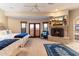 Spacious main bedroom with fireplace, large bed and mountain views at 28626 N 108Th N Way, Scottsdale, AZ 85262