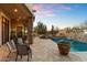 Spacious patio with comfortable seating overlooking the pool at 28626 N 108Th N Way, Scottsdale, AZ 85262