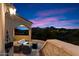 Outdoor patio area with seating and fire pit at 28626 N 108Th N Way, Scottsdale, AZ 85262