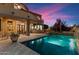 Luxury backyard oasis with a sparkling pool, spa, and outdoor fireplace at 28626 N 108Th N Way, Scottsdale, AZ 85262