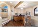 Custom wet bar with stone and wood finishes at 28626 N 108Th N Way, Scottsdale, AZ 85262