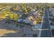 Aerial view of house, pool, and surrounding neighborhood at 31481 N Candlewood Dr, San Tan Valley, AZ 85143