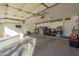 Garage with storage cabinets and work bench at 31481 N Candlewood Dr, San Tan Valley, AZ 85143