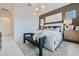 Bright and airy main bedroom with an accent wall at 3229 W Via Dona Rd, Phoenix, AZ 85083