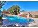 Refreshing swimming pool with a stone waterfall at 3816 E Minton Pl, Mesa, AZ 85215