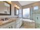 Elegant bathroom featuring double vanity and soaking tub at 40849 N Union Trl, Anthem, AZ 85086