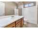 Clean bathroom with single vanity and shower/tub combo at 40849 N Union Trl, Anthem, AZ 85086