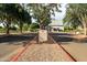 Barn-style community building with signage and landscaping at 4205 E Bonanza Rd, Gilbert, AZ 85297