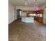 Open kitchen featuring a spacious island, granite countertops, and stainless steel appliances at 4943 S Las Mananitas Trl, Gold Canyon, AZ 85118