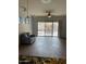 Open living room leading to the backyard patio at 4943 S Las Mananitas Trl, Gold Canyon, AZ 85118