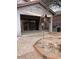 Covered patio featuring a brick floor and outdoor decor at 4943 S Las Mananitas Trl, Gold Canyon, AZ 85118